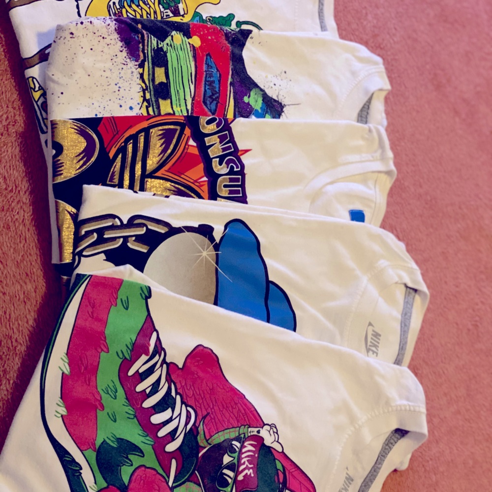 5 Nike Men’s Animated Tops